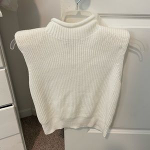 White sweater vest with shoulder pads